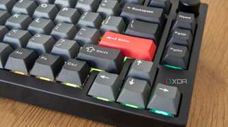 Close-up of the arrow keys on the Lemokey P1 Pro with RGB lighting under the keys
