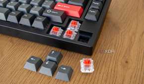 The arrow keys on the Lemokey P1 Pro with the keycaps and one of the switches removed