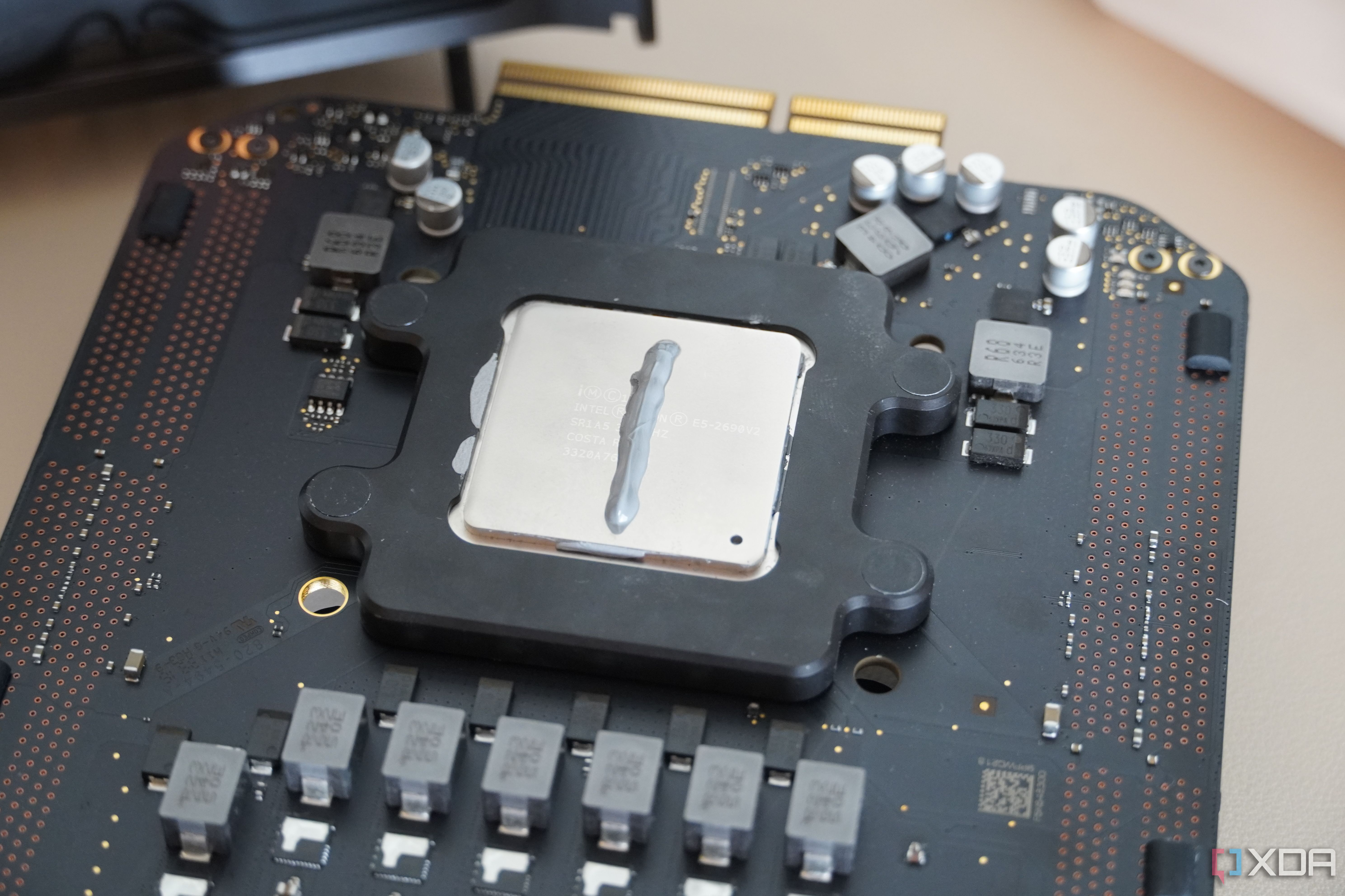 Thermal paste applied on a Mac Pro CPU.