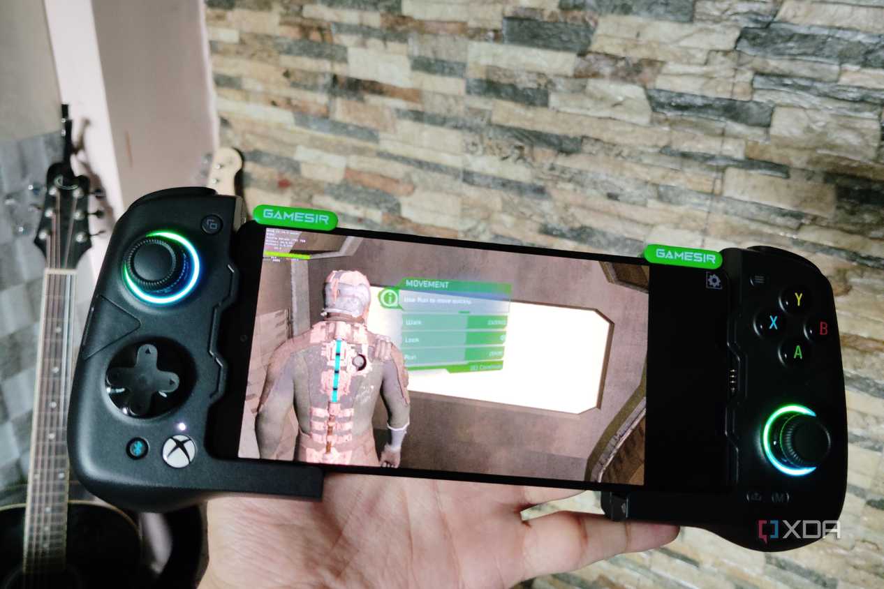 Dead Space running on a Poco F5 via Mobox, with a GameSir X4 Aileron controller connected to the phone
