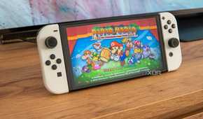 Angled view of a Nintendo Switch showing the title screen for Paper Mario The Thousand year Door
