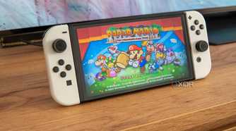 Angled view of a Nintendo Switch showing the title screen for Paper Mario The Thousand year Door