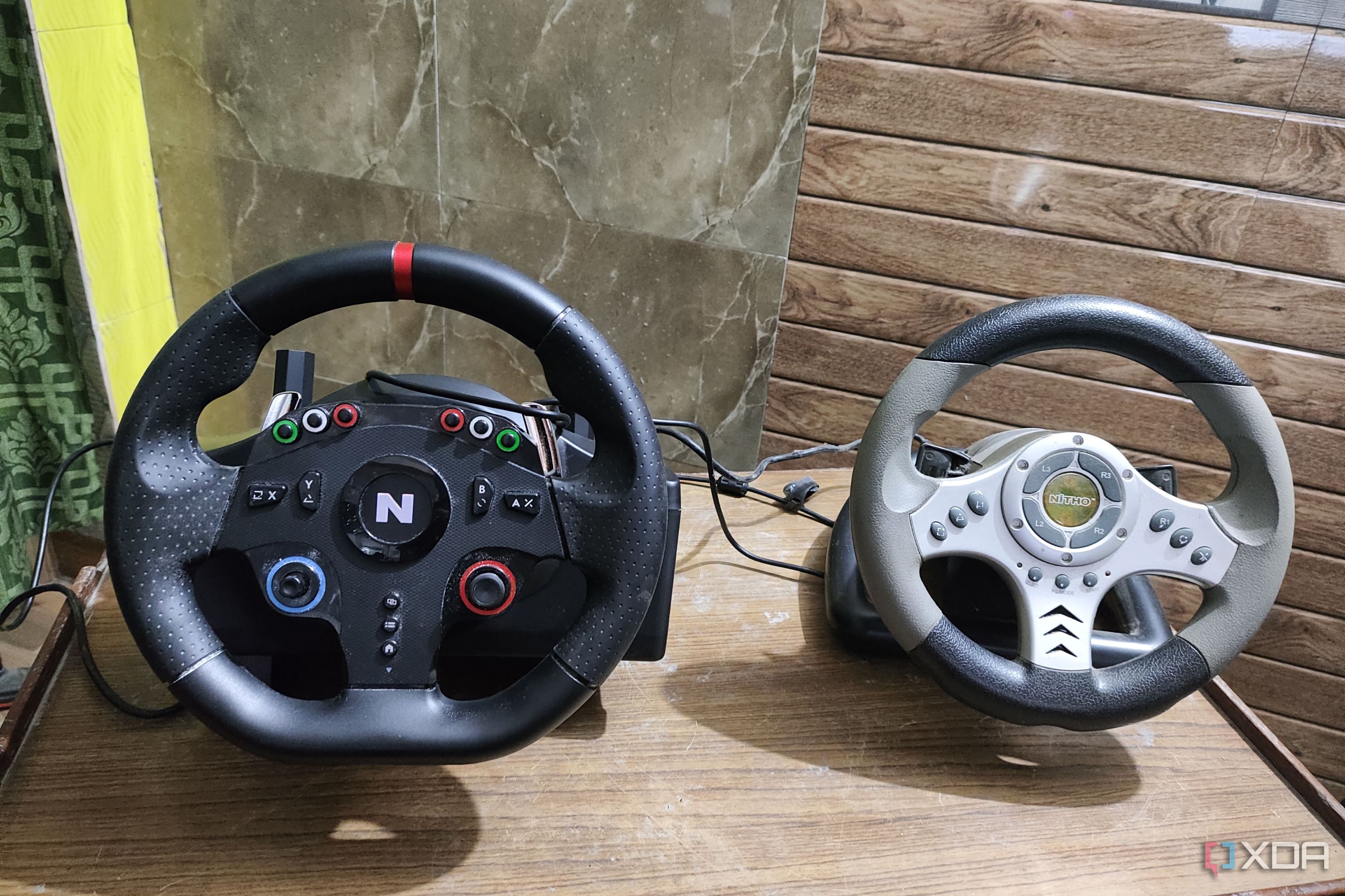 Two Nitho Driving Wheels placed side-by-side