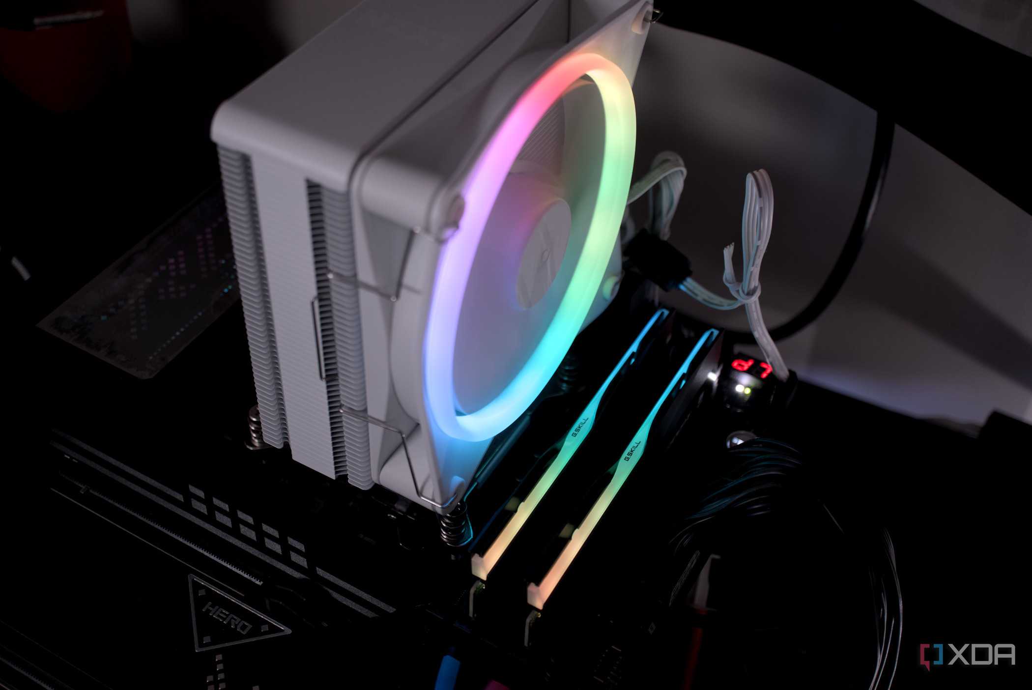 An image of an NZXT T120 RGB CPU cooler installed on a motherboard.