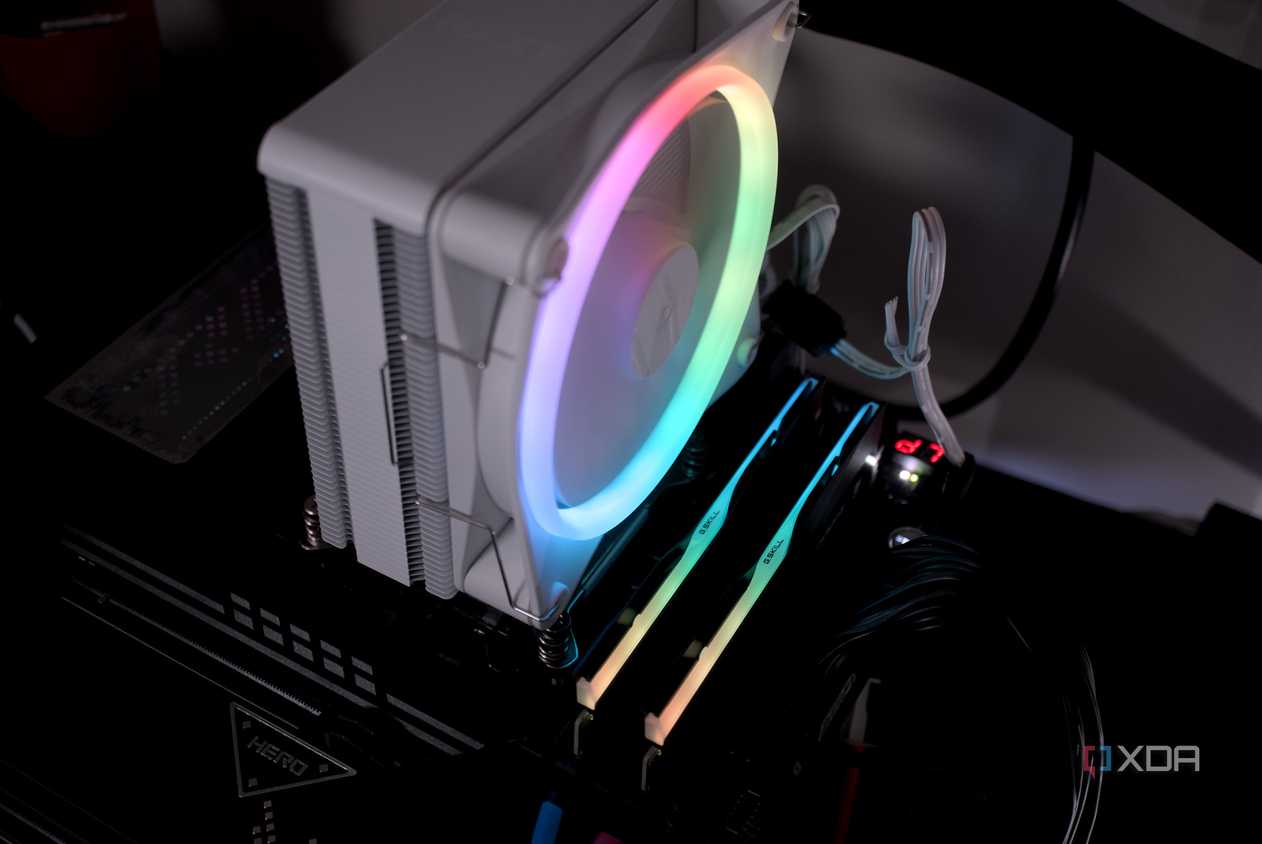 An image of an NZXT T120 RGB CPU cooler installed on a motherboard.