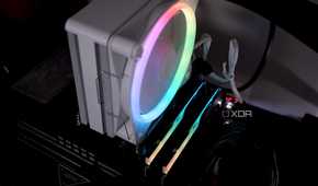 An image of an NZXT T120 RGB CPU cooler installed on a motherboard.