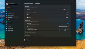 Screenshot of Windows 11 desktop with taskbar icons removed in the Settings app