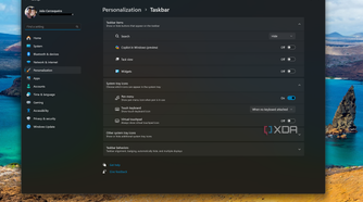 Screenshot of Windows 11 desktop with taskbar icons removed in the Settings app
