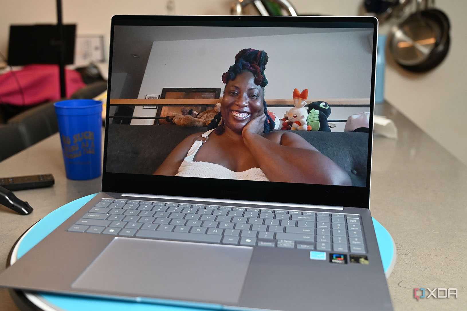 Webcam shot of African-American woman with colorful locs on Samsung Galaxy Book 4 Edge