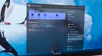 Close-up of a computer monitor displaying a Start11 Start menu on Windows 11