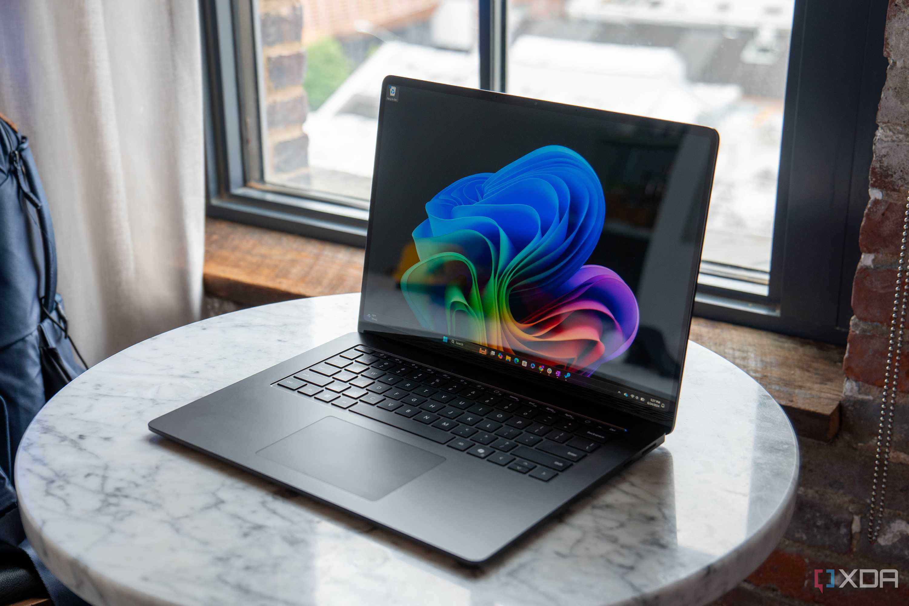 a surface laptop on a table