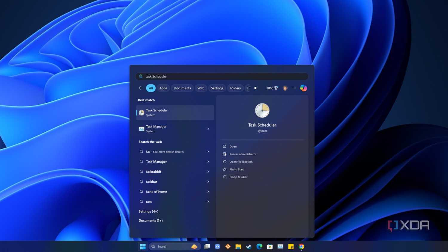 windows 11 desktop with start menu open showing task scheduler