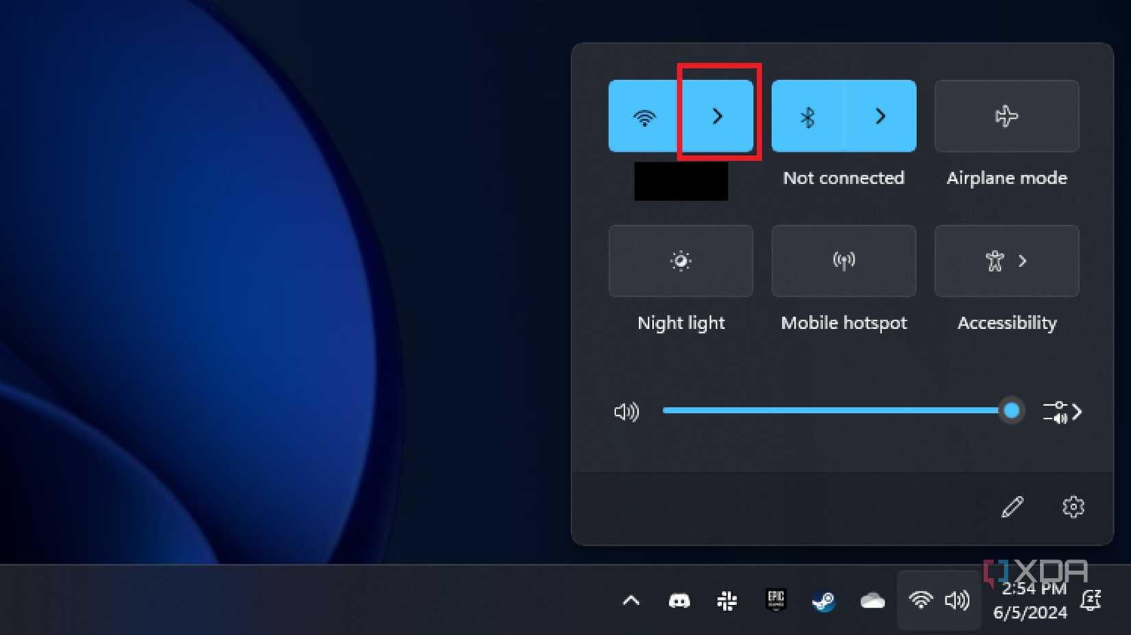 screenshot of windows 11 quick settings with the wifi list button highlighted
