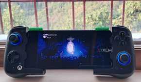 A GameSir X4 Aileron controller connected to a Poco F5, with the phone running Hollow Knight via Winlator