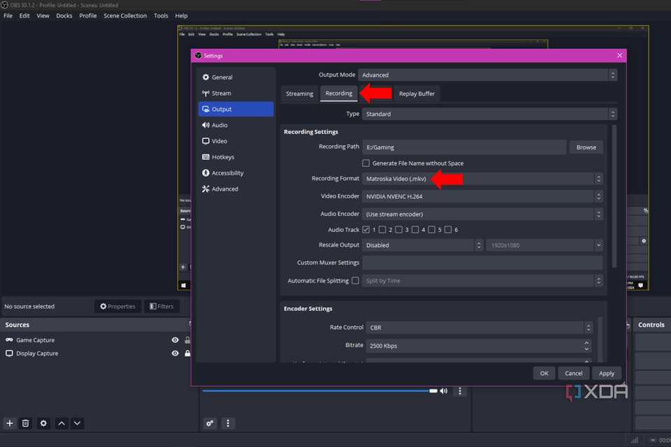 An arrow pointing to the Recording Format in OBS Studio