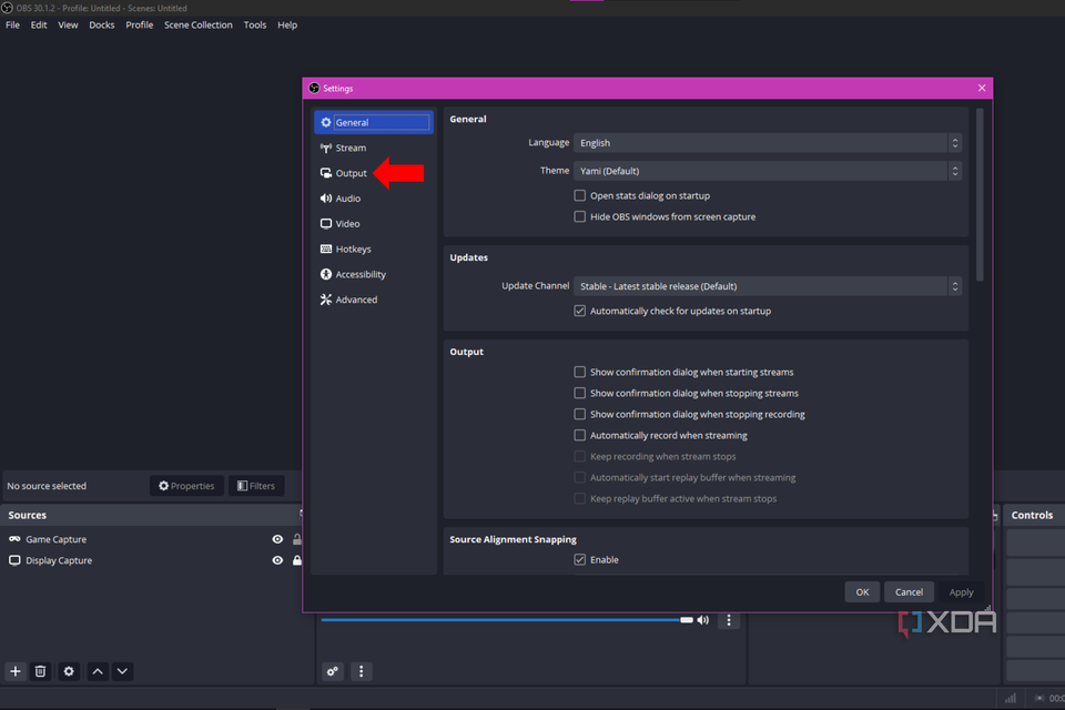 An arrow pointing to the output tab in the OBS Studio settings menu