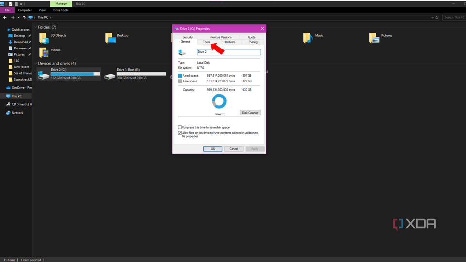 An arrow pointing to the tool tab
