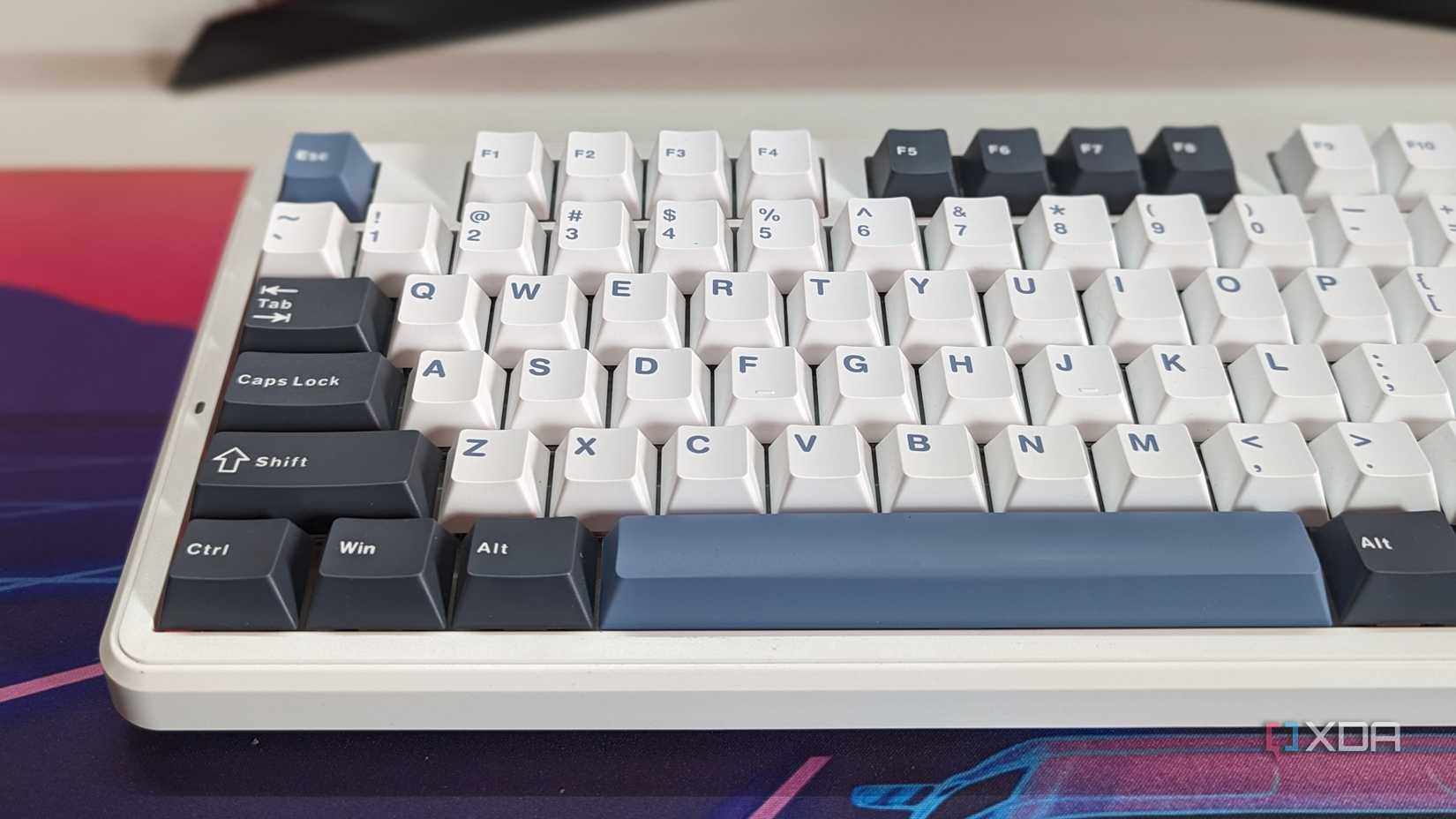Close-up of a keyboard showing white keycaps