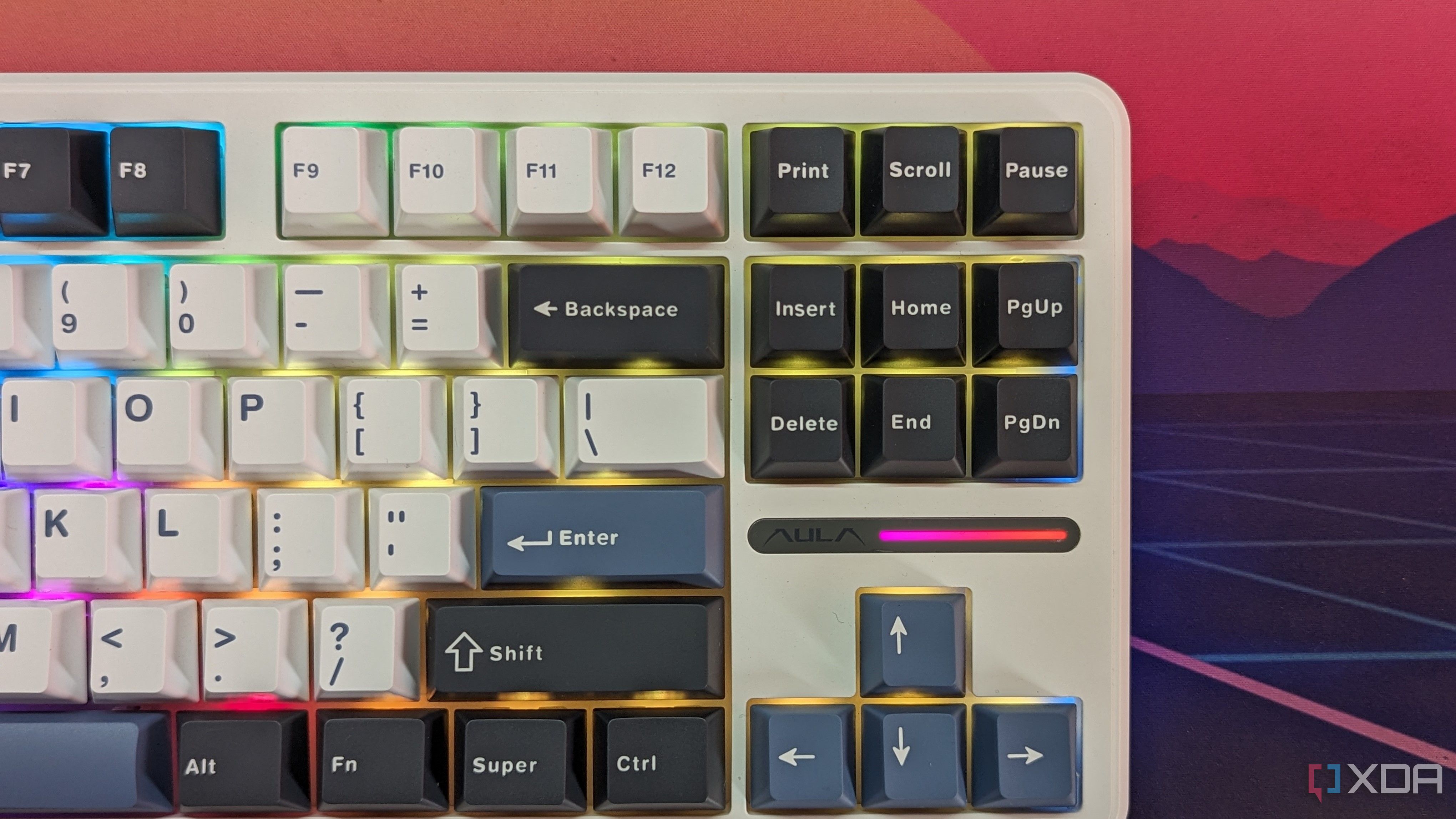 Close-up of a keyboard showing RGB lighting