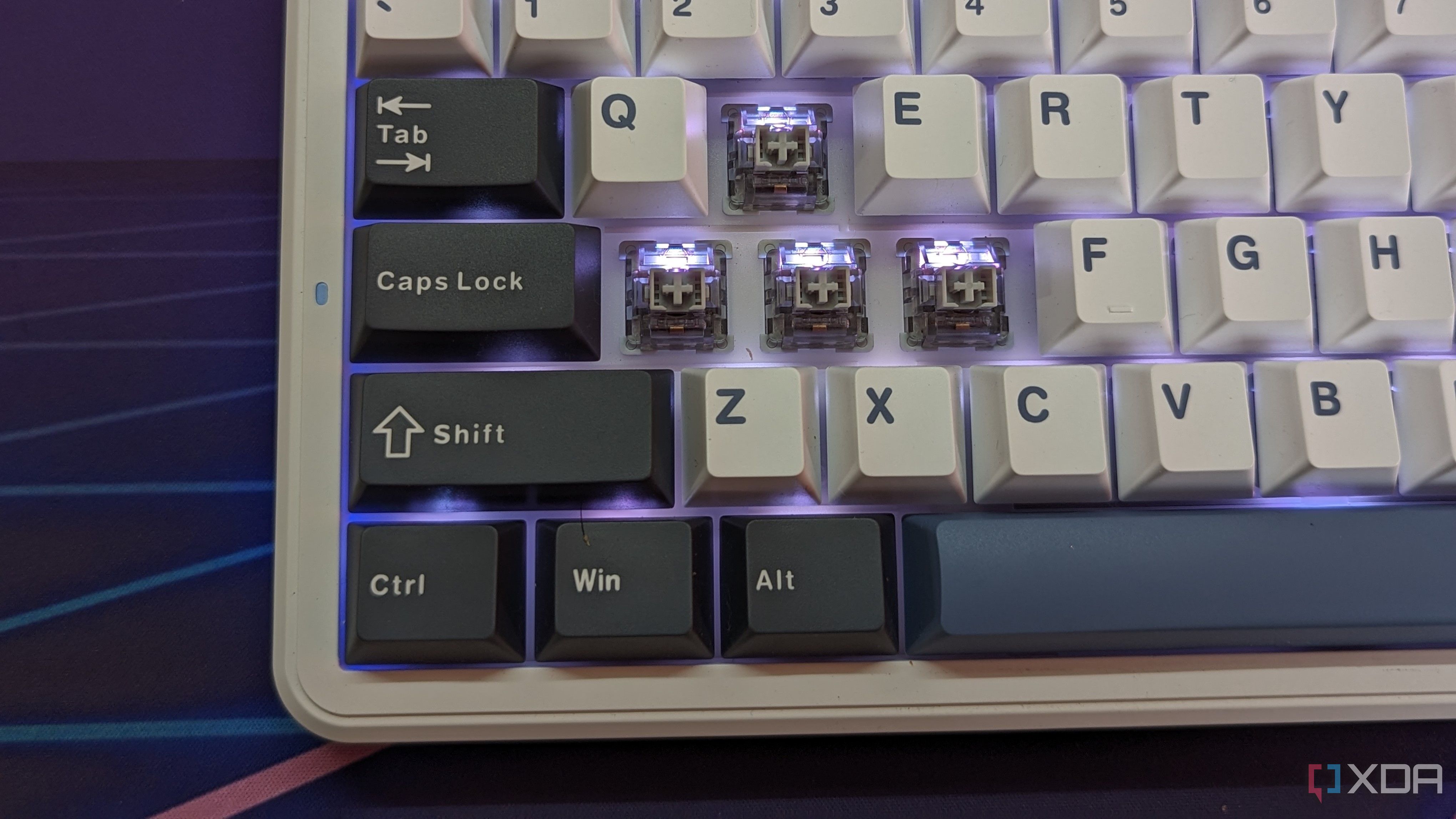 Close-up of a keyboard with some keycaps removed
