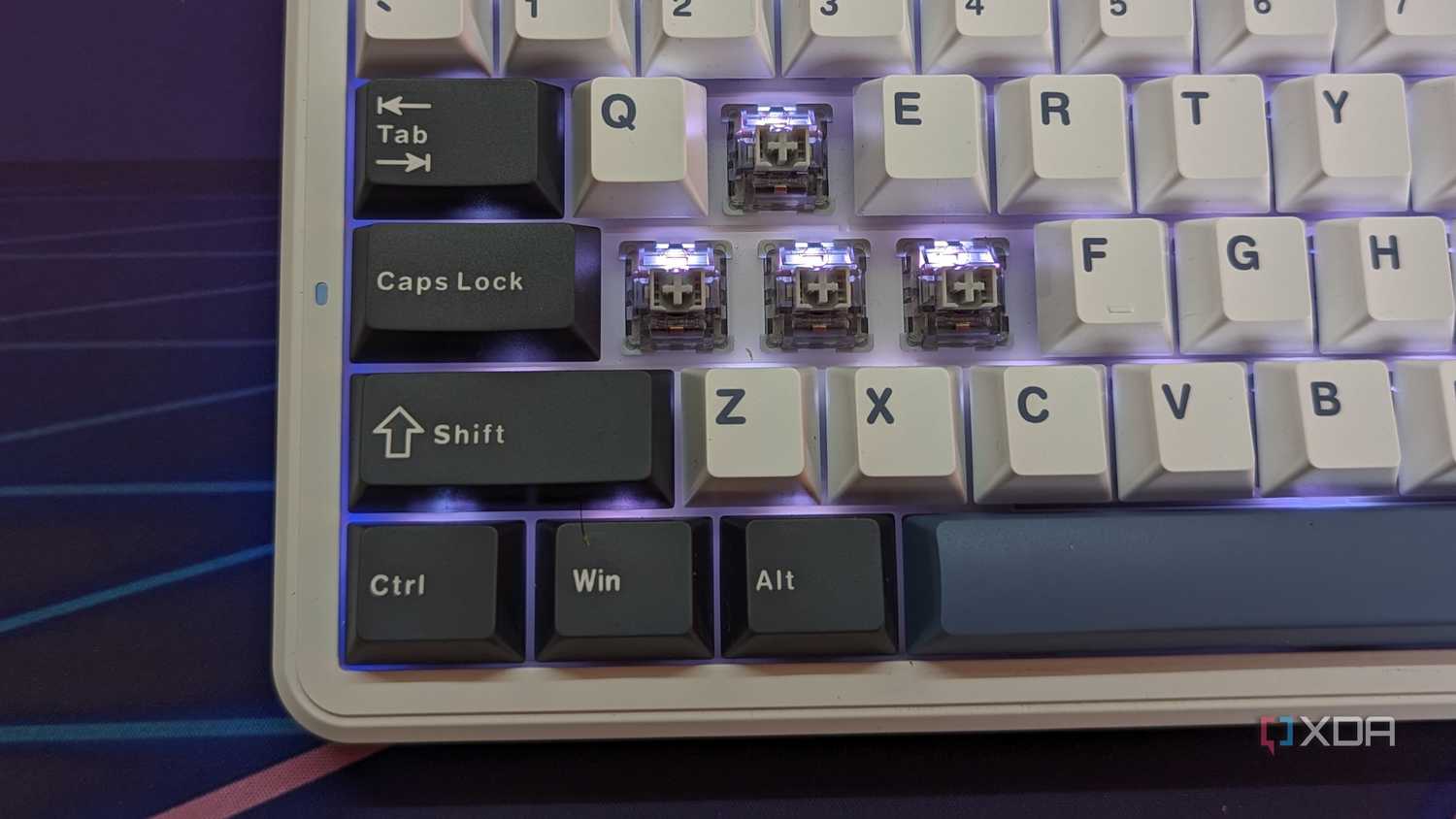 Close-up of a keyboard with some keycaps removed