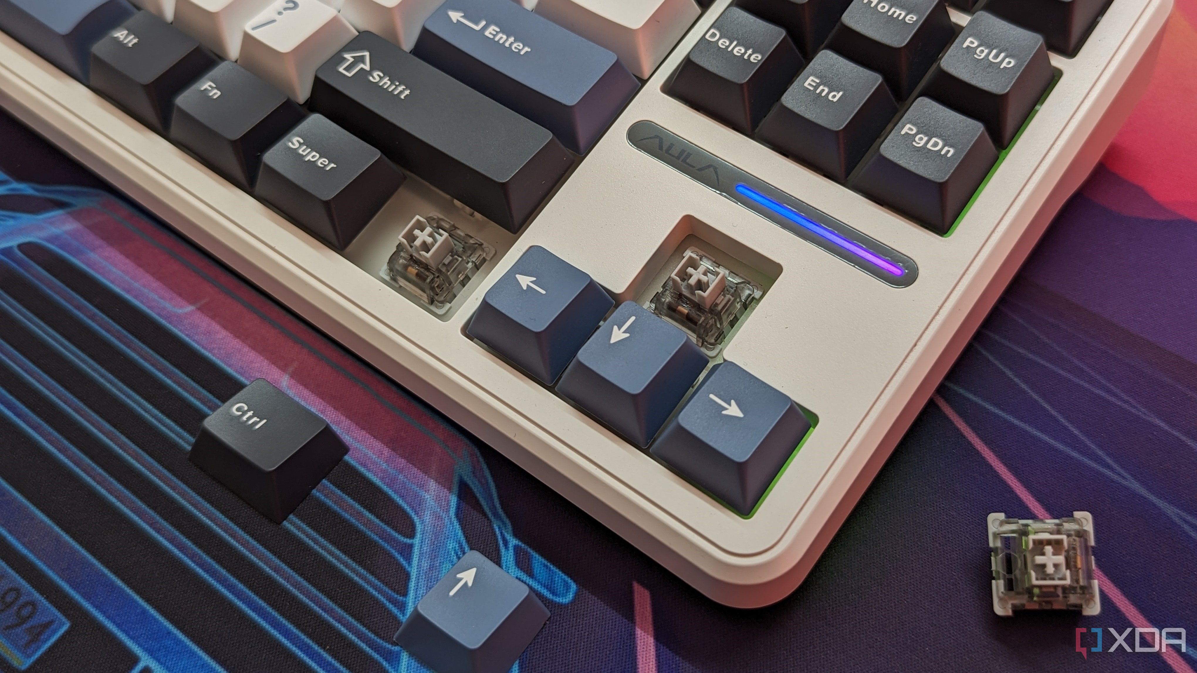 Close-up of a keyboard with some keycaps removed