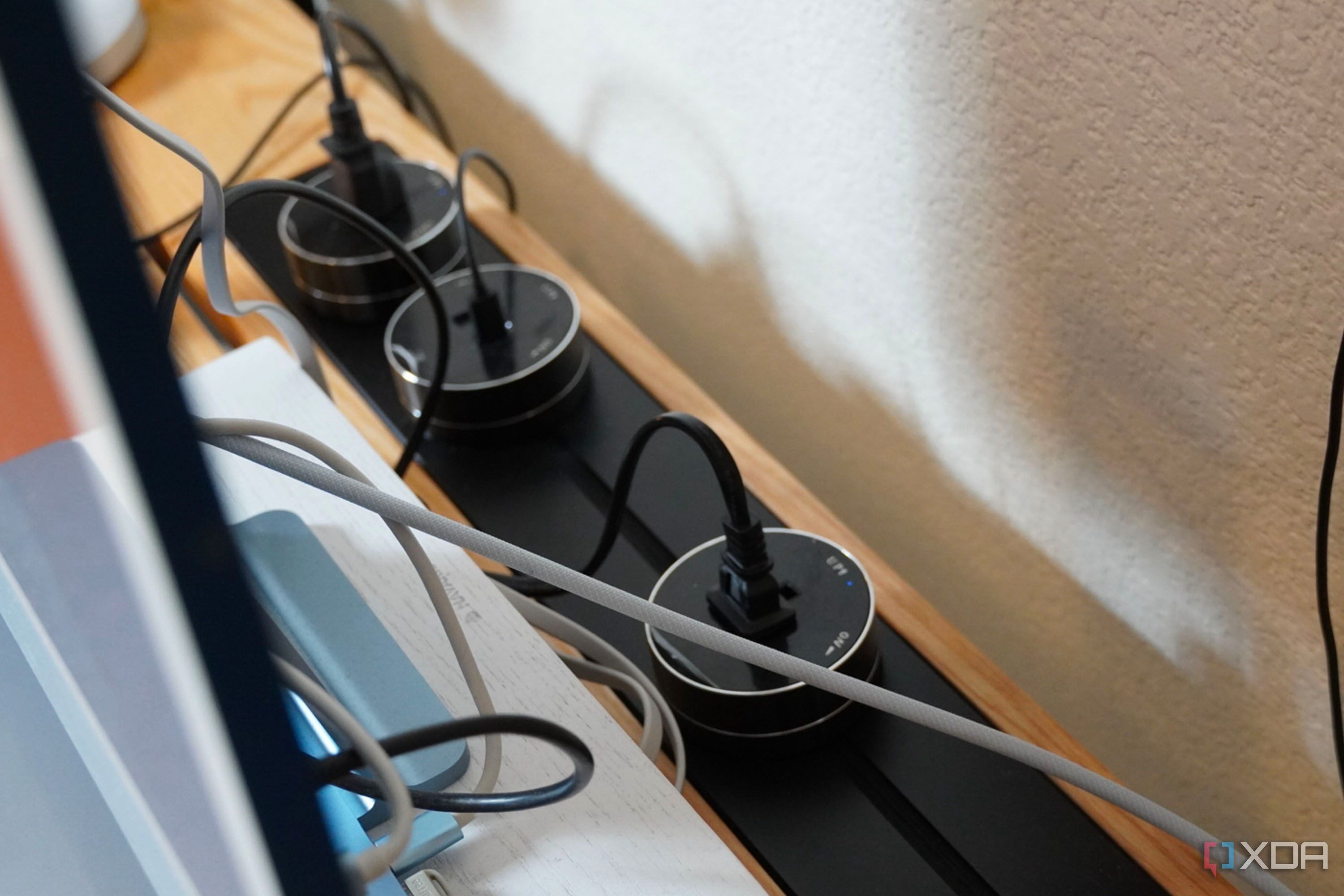 A lineup of power track system pucks.