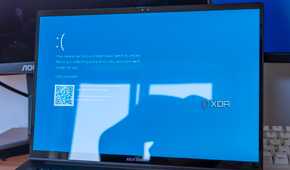 A laptop showing a Blue Screen of Death