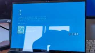 A laptop showing a Blue Screen of Death