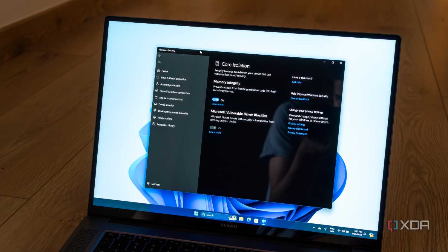 A Windows 11 laptop showing settings for Core isolation in the Windows Security app