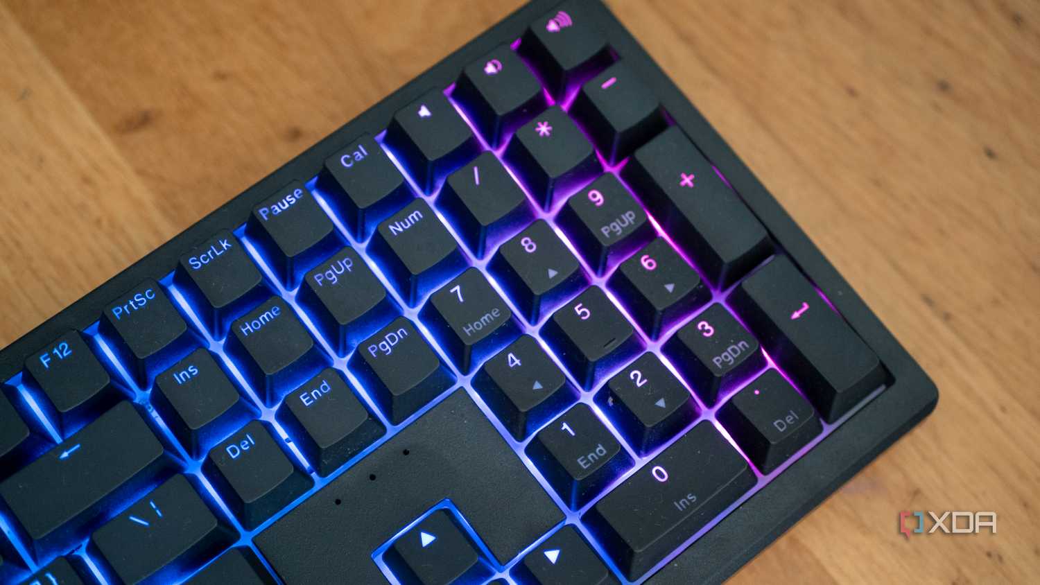 Ducky Zero 6108 numpad on a wooden desk