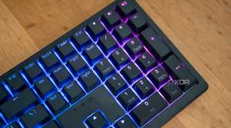 Ducky Zero 6108 numpad on a wooden desk