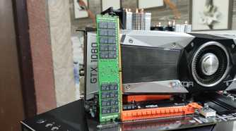 A 32GB ECC DDR4 RAM stick resting against a GTX 1080