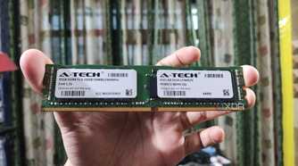 A person holding a 32GB ECC DDR4 RAM stick