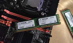 A 32GB ECC RAM stick resting on an X99 server motherboard