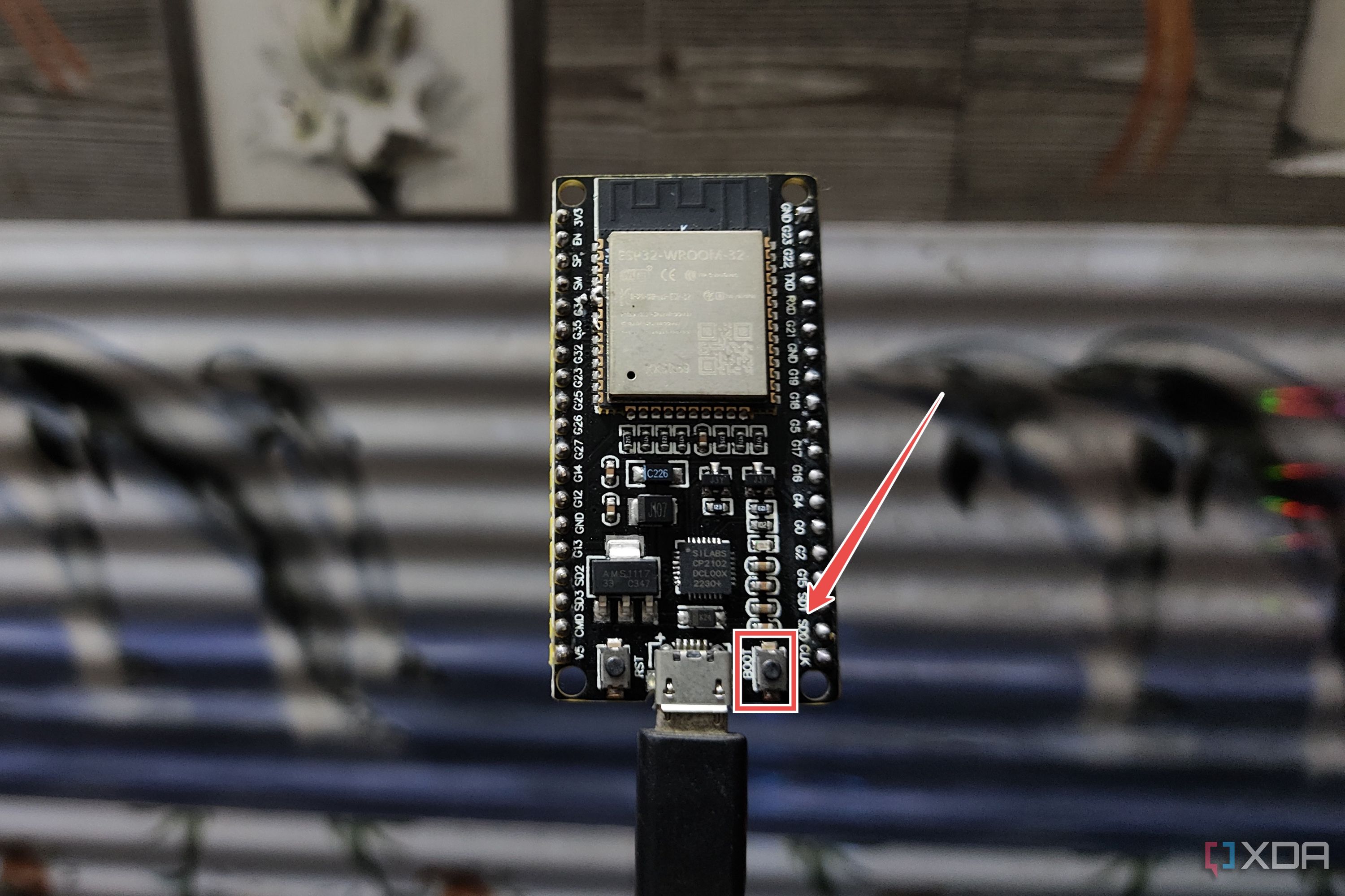 The Boot button highlighted on the ESP32 