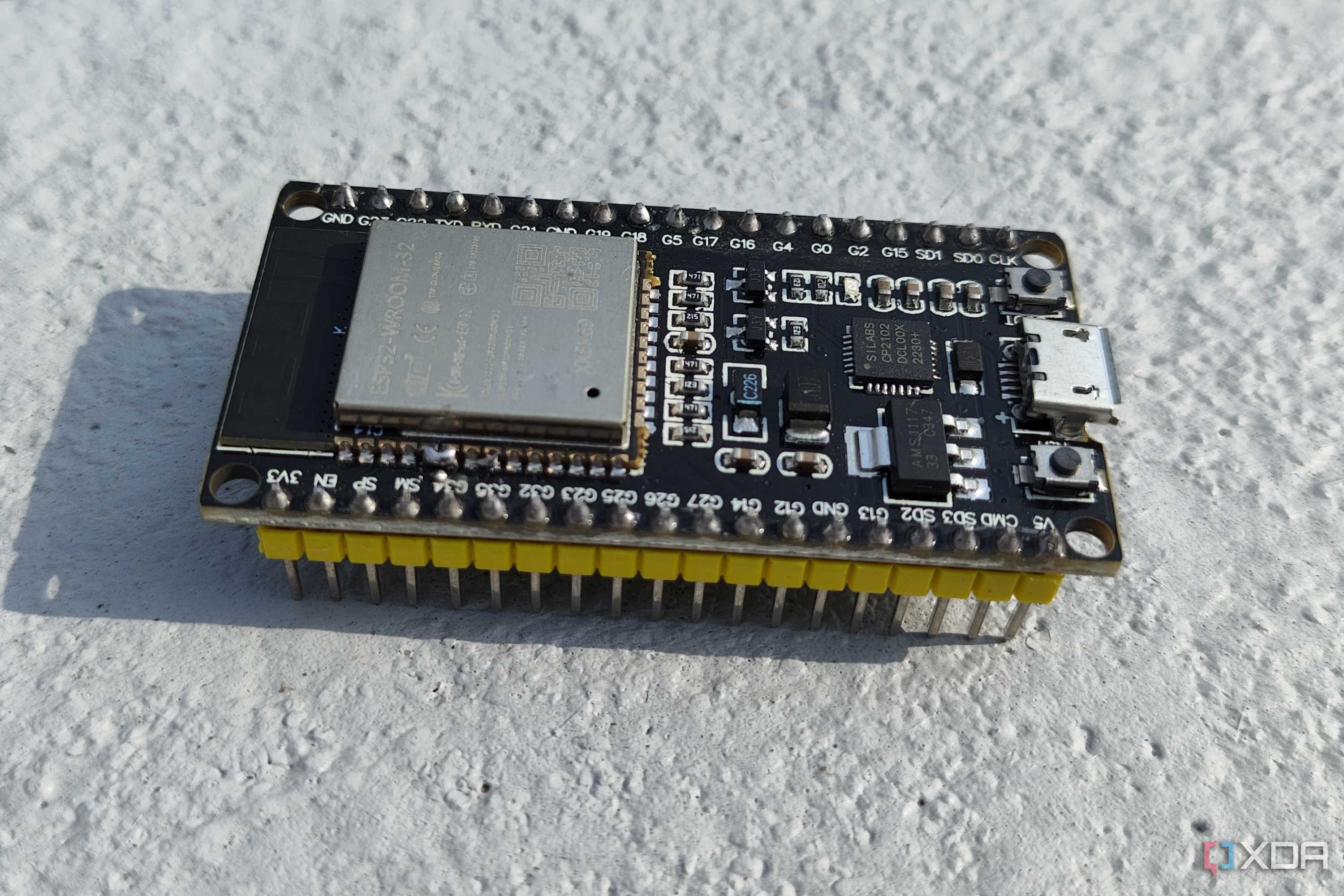 An ESP32 lying on a flat surface