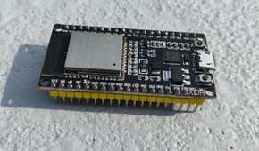 An ESP32 lying on a flat surface