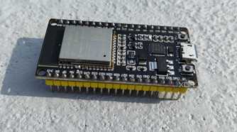 An ESP32 lying on a flat surface