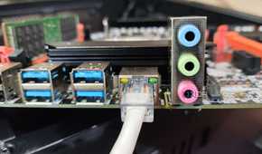 An Ethernet cable plugged into an RJ45 port
