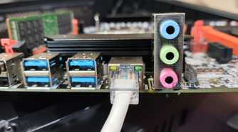 An Ethernet cable plugged into an RJ45 port