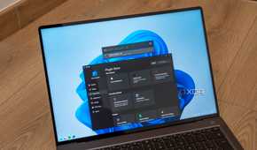 A Windows 11 laptop showing Flow launcher settings and the search bar