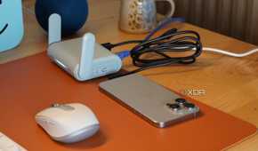 An iPhone connected to a travel router.