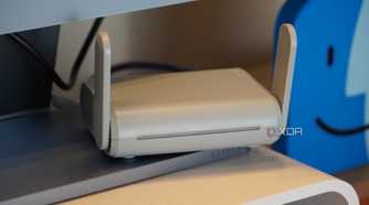 The Beryl travel router on a desk.
