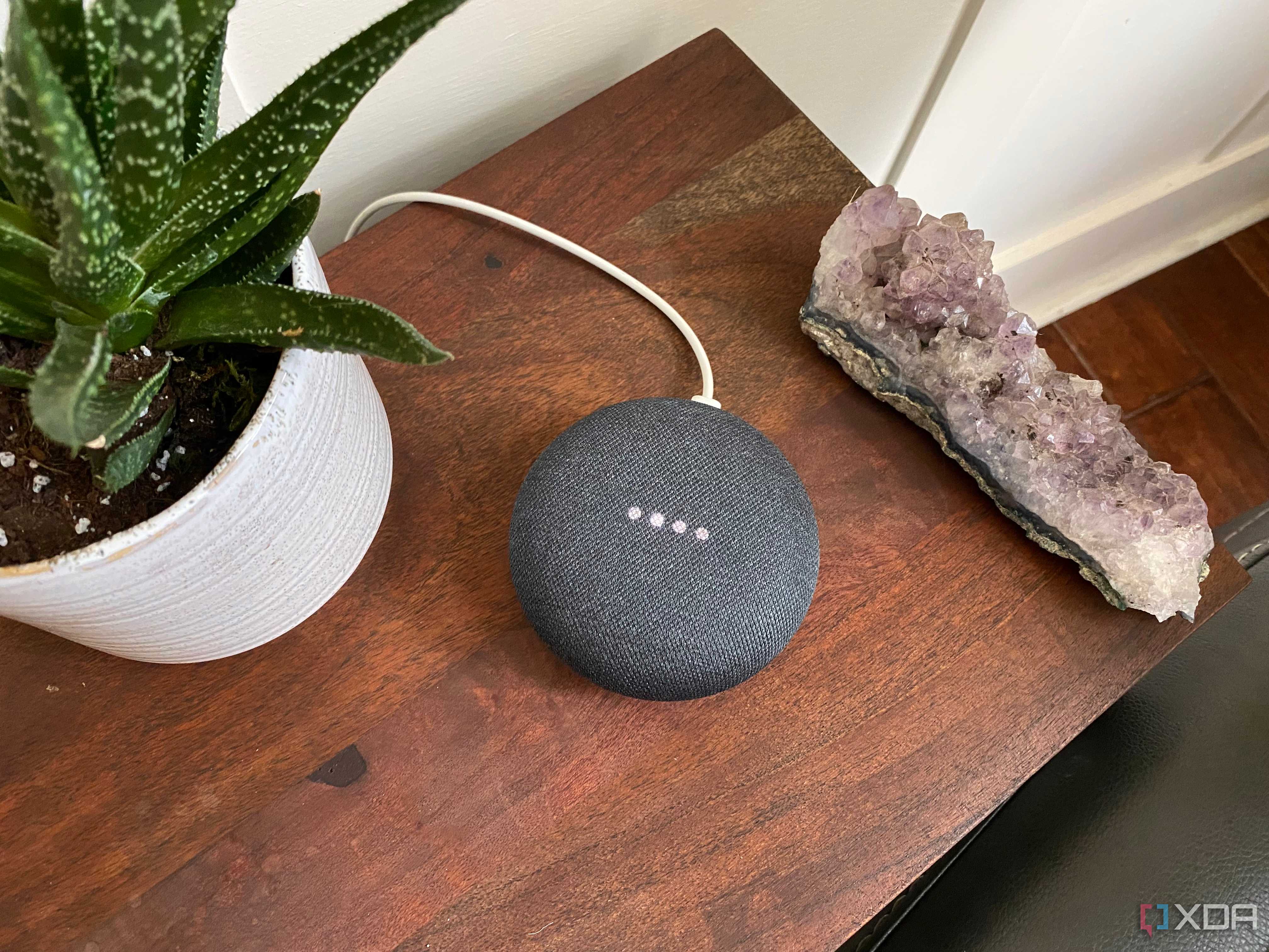 A Google Home Mini on a table