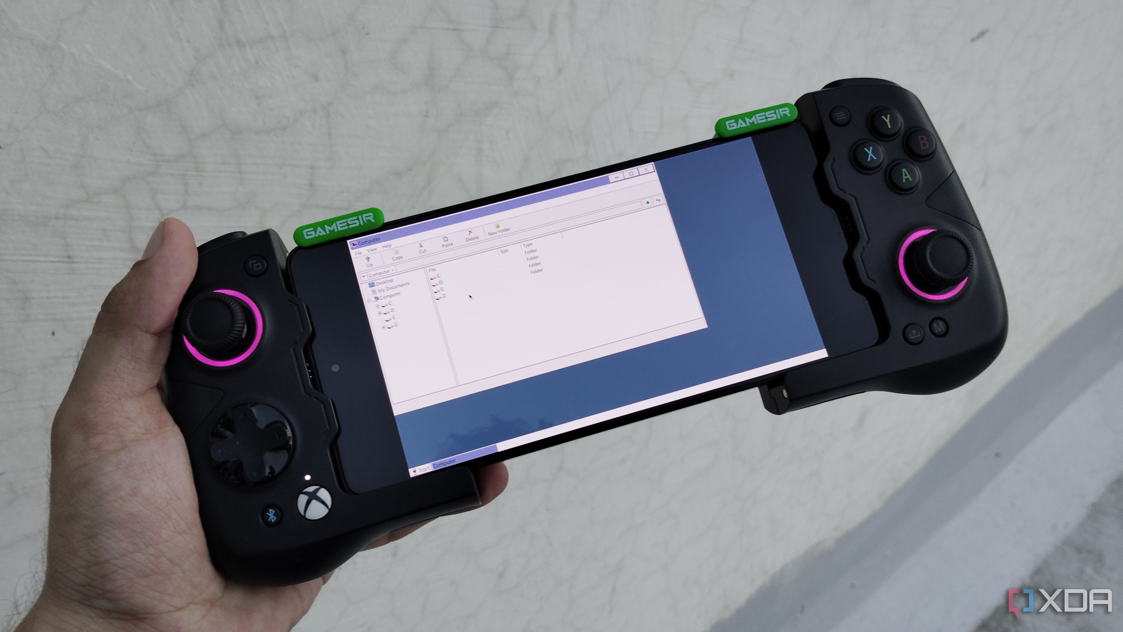 A Horizon-Emu container running on a Poco F5 connected to a GameSir X4 Aileron controller