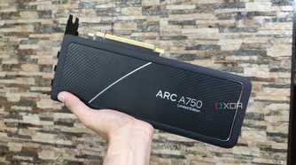 A person holding an Intel Arc A750