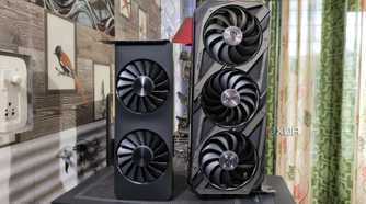 An Intel Arc A750 placed next to an ASUS Rog Strix RTX 3080 Ti