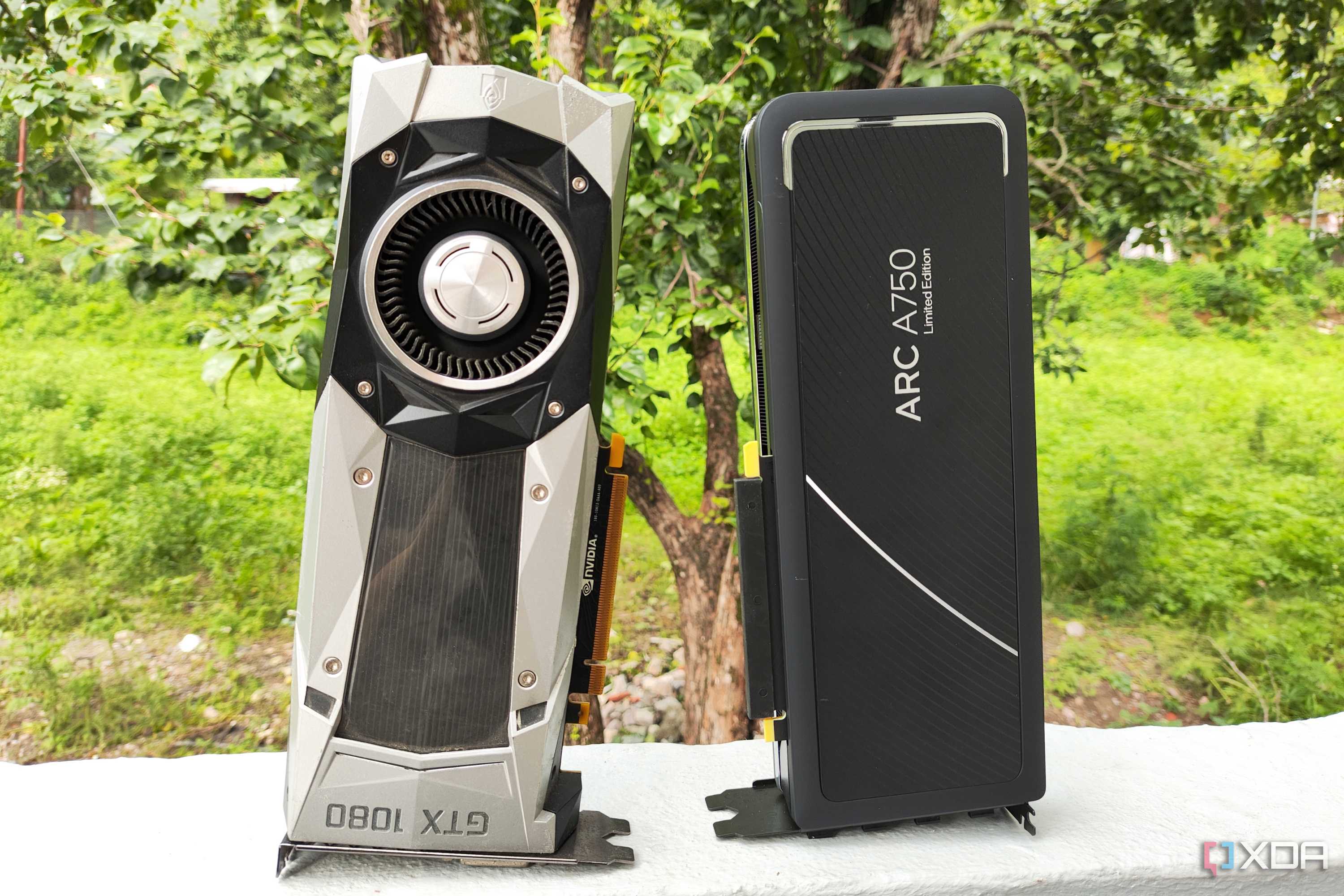 An Intel Arc A750 placed next to a GTX 1080 FE