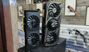 An Intel Arc A750 placed next to an ASUS Rog Strix RTX 3080 Ti